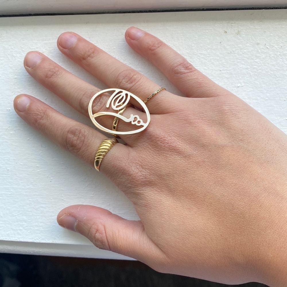 Abstract funky face ring